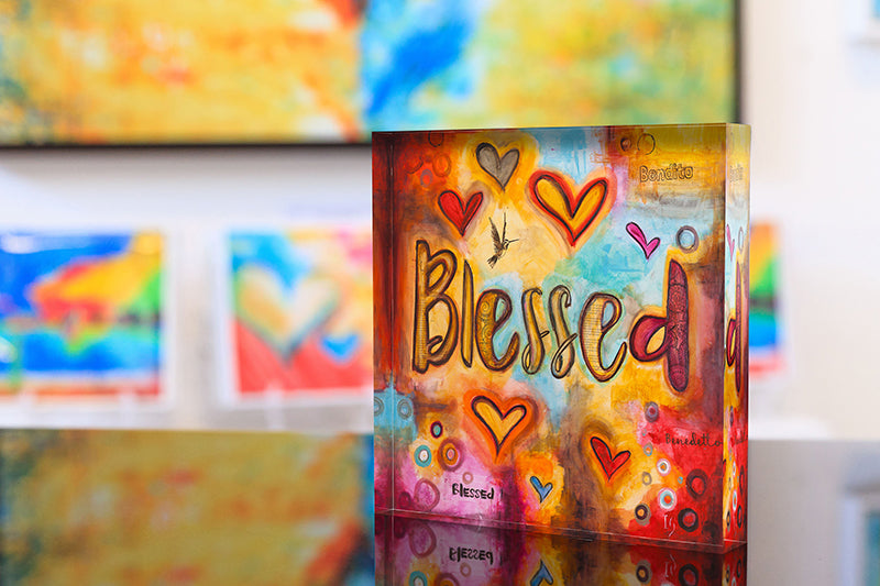 Inspiring acrylic art titled 'Blessed,' is a reminder of God's desire for us to lead blessed and fruitful lives. Reflects feelings of bliss, strength, love, and empowerment.