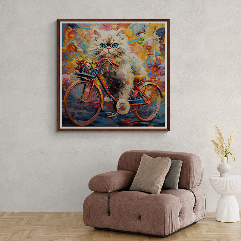 Kitten with blue eyes riding a bike, displayed as colorful wall art in a modern room